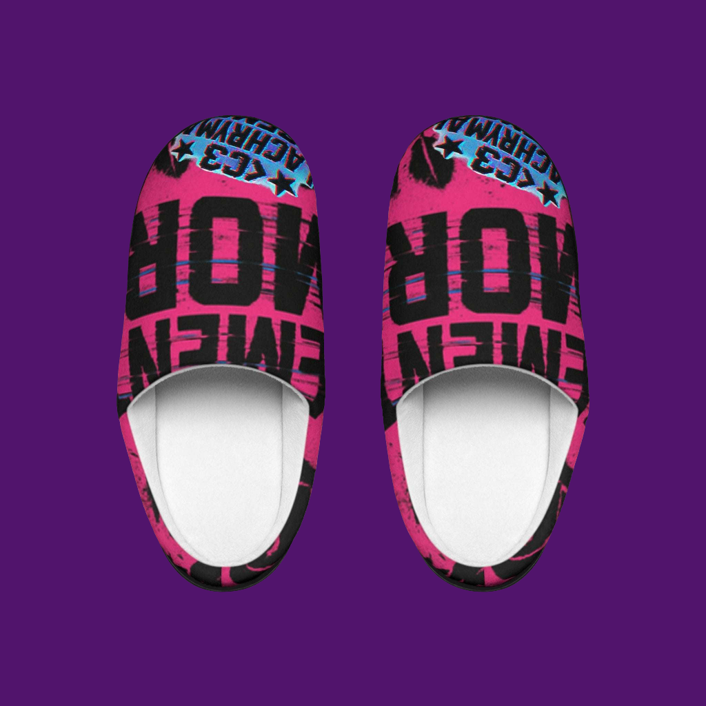 Pink and black slip-on shoes with text design on a purple background