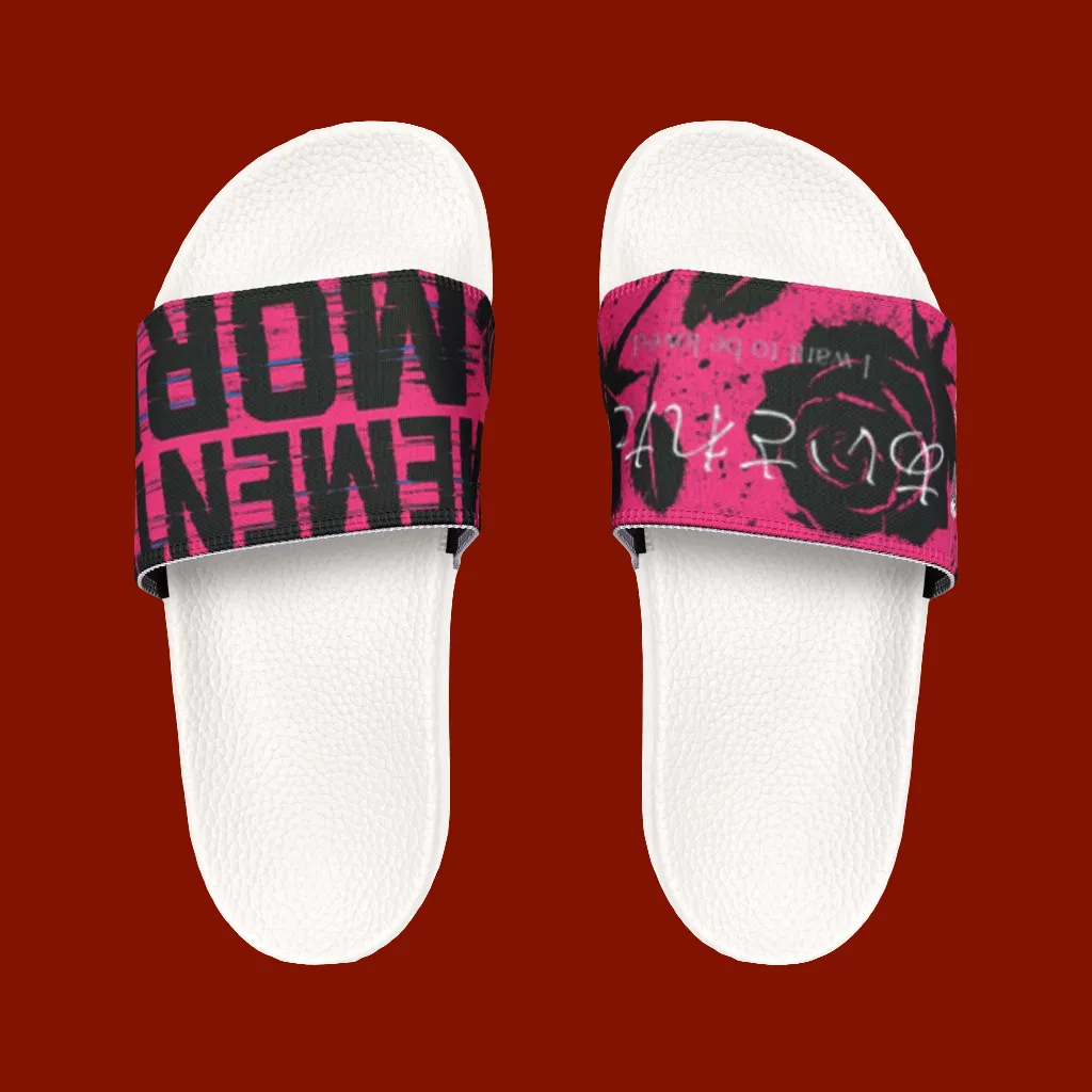 White slides with pink and black strap on a red background