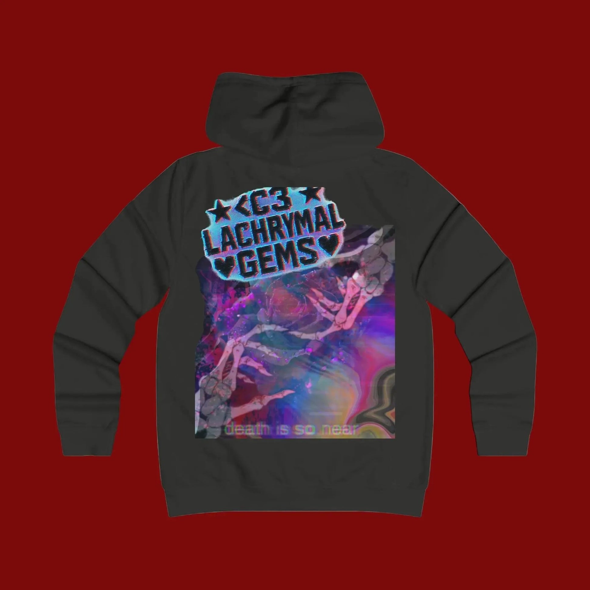Black hoodie with colorful graphic and text on the back against a red background